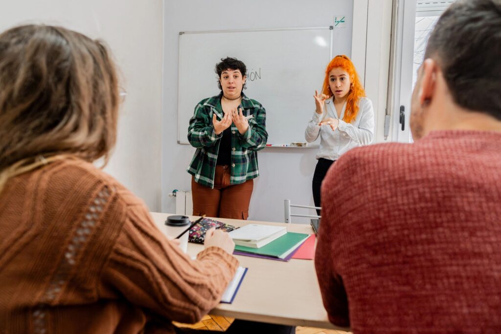 Students doing presentation during sign language class