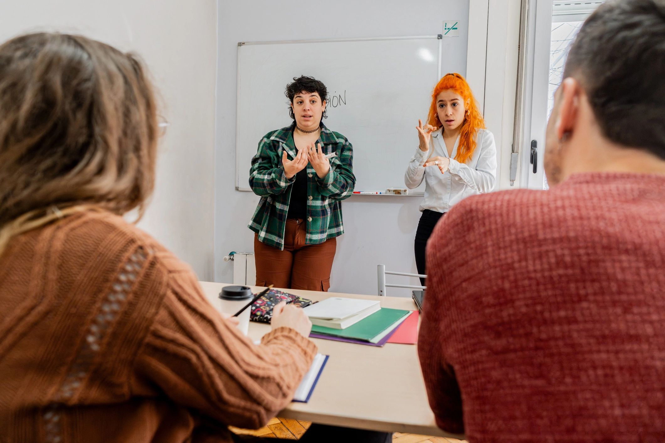 Students doing presentation during sign language class